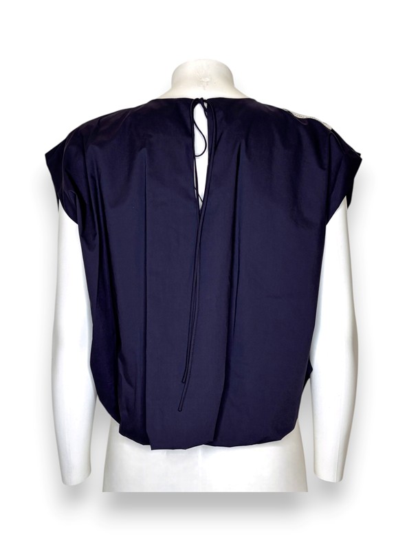 Blusa cropped senza maniche