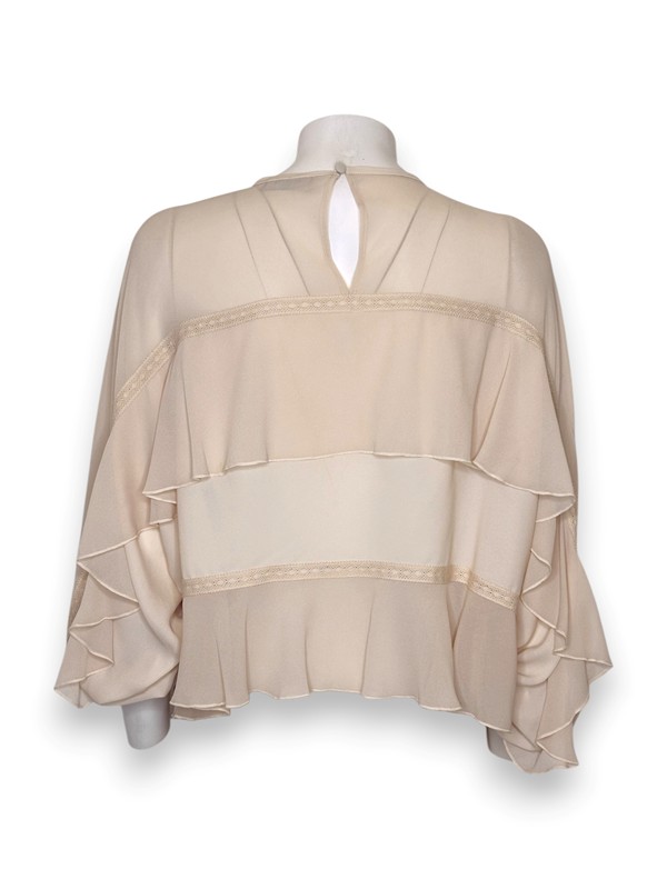 Blusa cropped over a balze